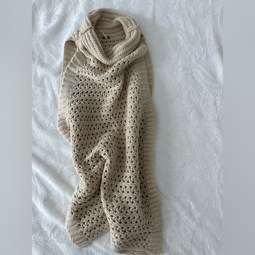 Free people sweater top or coverup, cute in shorts or pants.